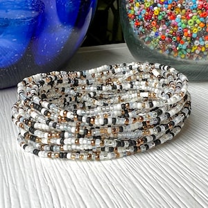 Dainty Seed Bracelet Neutral Color Beaded Jewelry Minimal Design Everyday Accessory Thin Stretch Glass Bead Elastic Band Comfortable Fit Minimalist Style Perfect Daily Wear Casual Fashion Essential Versatile Wrist Accessory Layering Piece