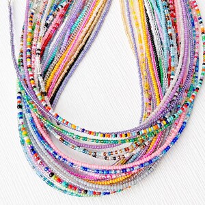 Delicate Glass Jewelry Tiny Seed Bead Necklace Minimalist Beaded Accessory Dainty Wire Strand Collection Perfect Layering Essential Everyday Wear Simple Boho Style Design Adjustable Length Versatile Accessory Handcrafted Quality Beautiful