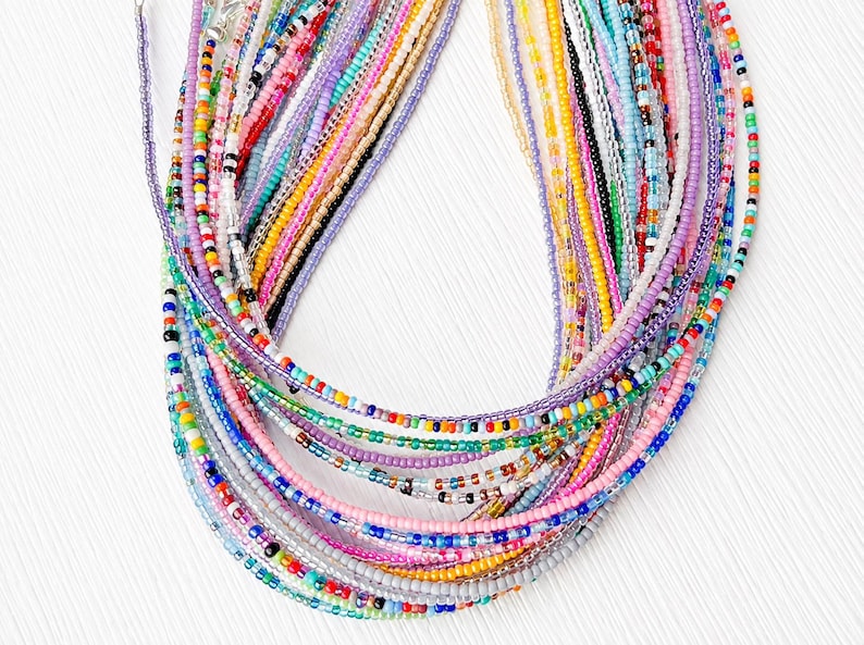 Delicate Glass Jewelry Tiny Seed Bead Necklace Minimalist Beaded Accessory Dainty Wire Strand Collection Perfect Layering Essential Everyday Wear Simple Boho Style Design Adjustable Length Versatile Accessory Handcrafted Quality Beautiful