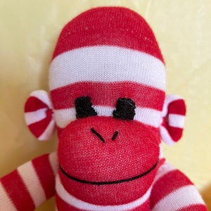 Candy Cane Sock Monkey Red and White Stripe ready for Christmas