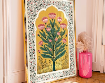 May include: A rectangular framed print featuring a central golden archway containing a stylised green tree with pink, rounded flower heads. The border is decorated with a dense pattern of small pink flowers and green leaves on a white background.