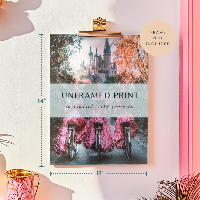 May include: An unframed print of a whimsical scene featuring three bicycles adorned with pink tinsel, riding past a castle in the background. The print is 11x14 inches and is labelled "UNFRAMED PRINT in standard 11x14" poster size".