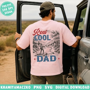 May include: Pale pink t-shirt featuring the text "Reel Cool Dad" above a fishing scene graphic. The graphic shows a fisherman, river, trees, and mountains. The shirt also has the text "PNG SVG 300 DPI DESIGN".