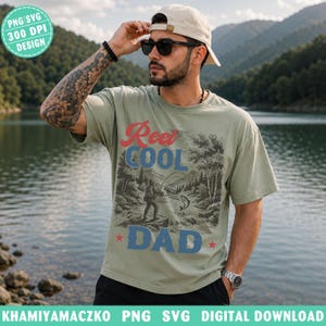 May include: A khaki t-shirt with the text "Reel Cool Dad" in red and blue. The shirt features a graphic of a fisherman and a fish, with a scenic background. The image includes a PNG SVG 300 DPI design.