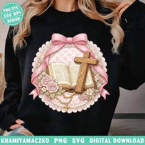 May include: Black sweatshirt featuring a religious design. The design includes an open book, a wooden cross, pink roses, and a rosary. A pink ribbon and lace frame the central image. The text "PNG SVG 300 DPI DESIGN" is in the upper left corner.