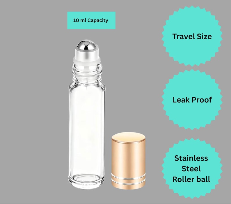 May include: A clear glass roller bottle with a stainless steel roller ball and a gold-colored cap. The bottle has a 10 ml capacity and is labeled as travel size and leak proof.