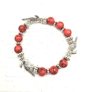 Tropical Bird Bracelet with Red and Silver Beads