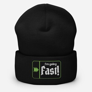 May include: Black beanie with a green and white embroidered patch that says "I'm going Fast!"