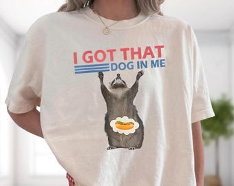 Camiseta "Tengo ese perro dentro de mí", divertida camiseta con meme de mapache, gráfico de nube de perrito caliente.