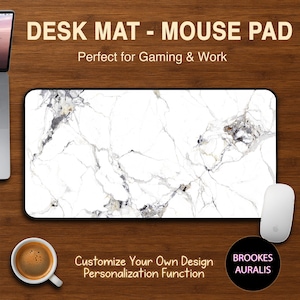 May include: A rectangular desk mat with a white marble effect, a white mouse, and a coffee cup on a wooden surface. The mat features the text "DESK MAT - MOUSE PAD" and "Perfect for Gaming & Work". Additional text reads "Customize Your Own Design Personalization Function".