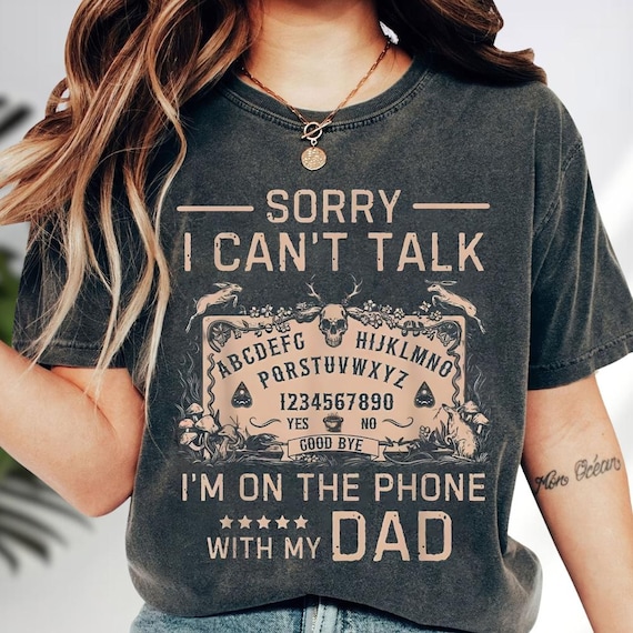 Sorry I Can't Talk I'm On The Phone With My Dad Ouija Board T-Shirt, Ouija Board Shirt, Halloween Shirts, Funny Spiritual Graphic Shirt
