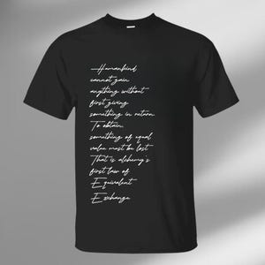 May include: Black t-shirt with white text. The text reads: "Humankind cannot gain anything without first giving something in return. To obtain something of equal value must be lost. That is alchemy's first law of Equivalent Exchange."
