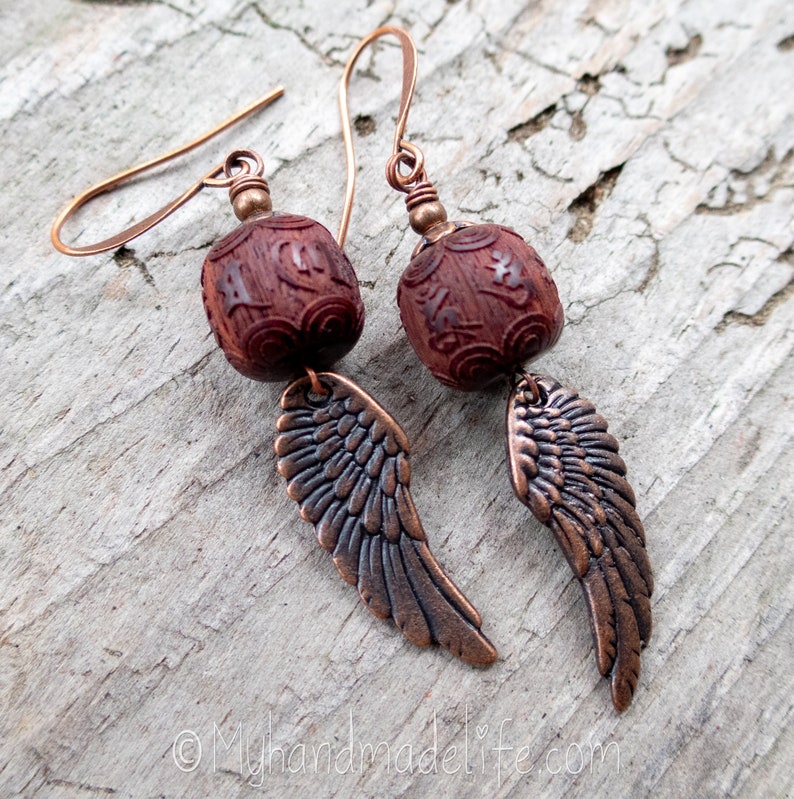 Wing and a Prayer Earrings Natural Carved Blackwood Om Mani Padme Hum Beads Copper Wing Earrings Angel Wing and Om Earrings Under 25 image 4