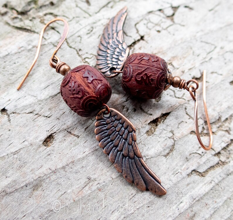 Wing and a Prayer Earrings Natural Carved Blackwood Om Mani Padme Hum Beads Copper Wing Earrings Angel Wing and Om Earrings Under 25 image 5
