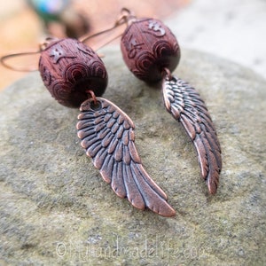 Wing and a Prayer Earrings Natural Carved Blackwood Om Mani Padme Hum Beads Copper Wing Earrings Angel Wing and Om Earrings Under 25 image 8