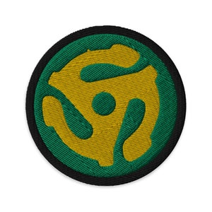 May include: A green and gold embroidered iron-on patch featuring a stylized record player logo.
