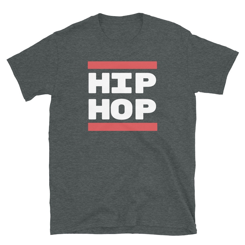 May include: Dark grey t-shirt featuring the words "HIP HOP" in white, bold capital letters, set between two red horizontal lines. The tee shirt has a crew neck and short sleeves.