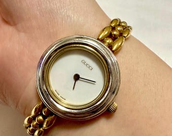 Reloj Gucci 11,12 de oro con batería nueva