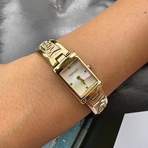 Yves Saint Laurent Quartz Vintage  Women&#39;s Watch Gold   stainless strap