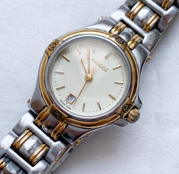 Gucci  9040L  women   Vintage Watch silver  gold stainless strap