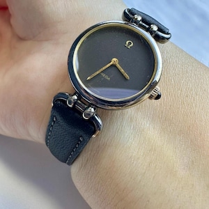 Reloj Omega Deville de cuarzo vintage, color oro.