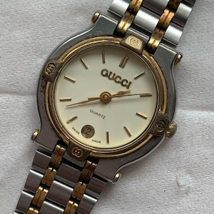 Gucci  9000L women  Mens Vintage Watch silver  gold stainless strap