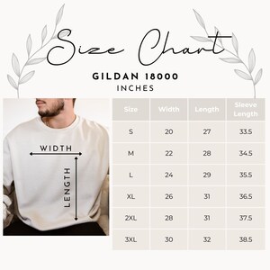 May include: A size chart for a Gildan 18000 sweatshirt, with measurements in inches. The chart includes sizes S to 3XL, detailing width, length, and sleeve length. The image also shows a person wearing the sweatshirt.