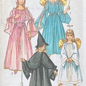 May include: Illustration of four children's costumes: a princess in pink, a fairy in blue, an angel in white, and a witch in black. The costumes are designed for children aged 2-4 years old.