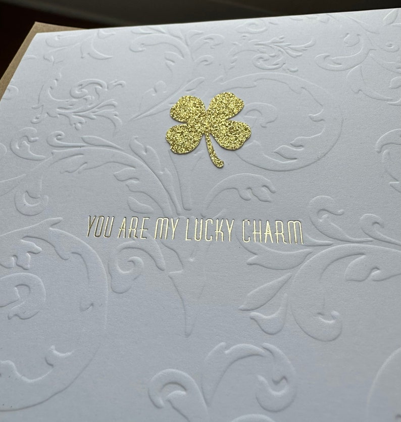 You are my lucky charm sparkle shamrock in gold foil over embossed flourish letterpress card with hot foiled clover love note image 1