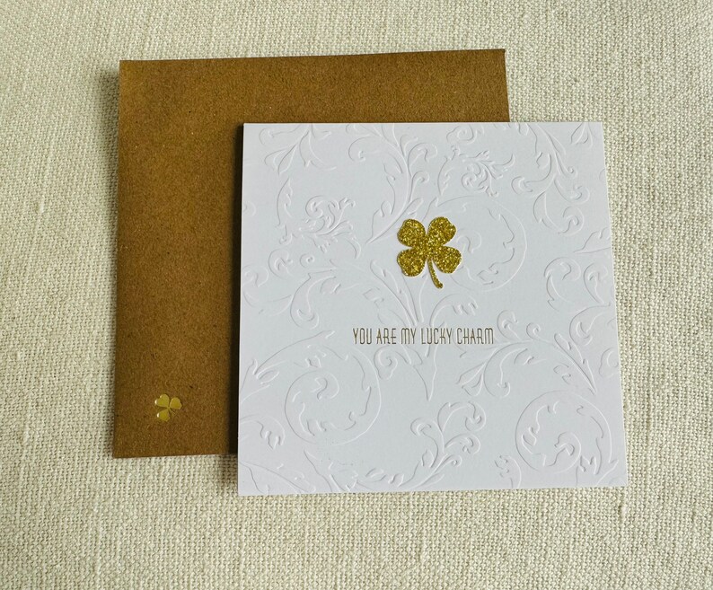 You are my lucky charm sparkle shamrock in gold foil over embossed flourish letterpress card with hot foiled clover love note image 2
