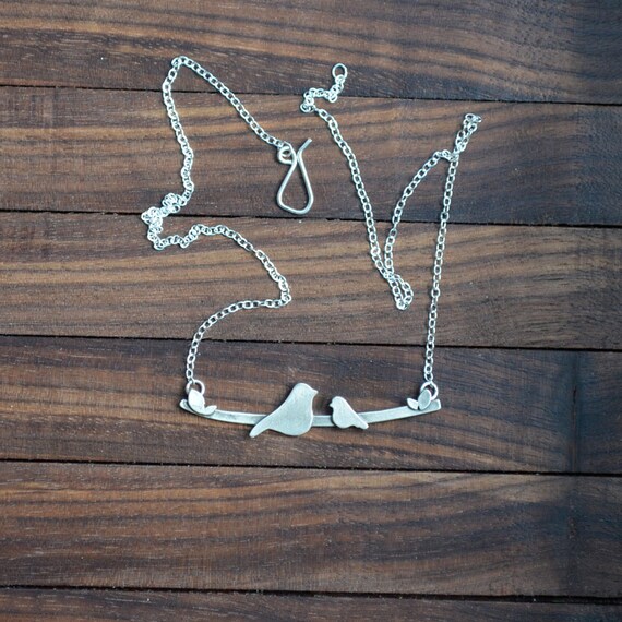 Mother nestling hotsell birds necklace