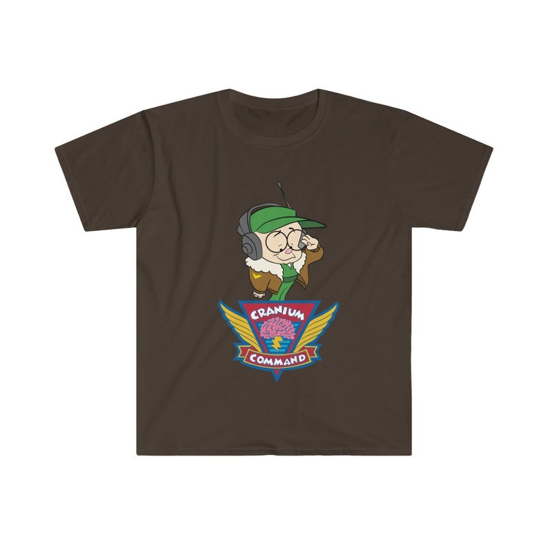 May include: A brown t-shirt with a cartoon character wearing a green cap and headset. The design includes the words "Cranium Command" and a brain graphic with wings.