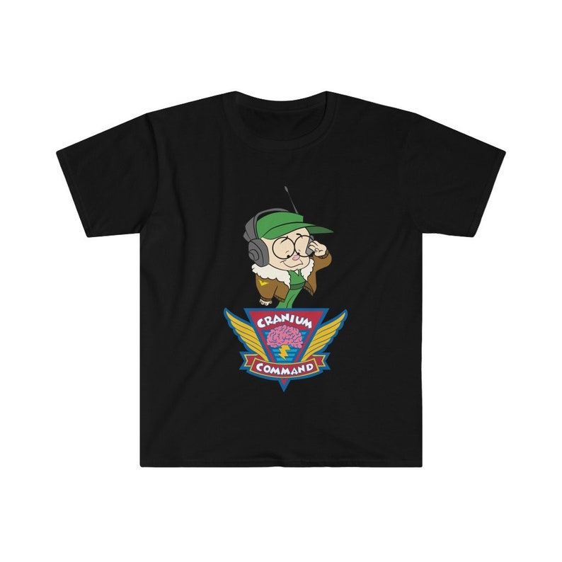 May include: Black t-shirt with a cartoon character wearing a green cap and headset, holding a microphone. Below the character is a colourful emblem with the words "Cranium Command" and a brain graphic.