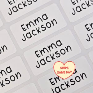 May include: A rustic wooden sign with the text "Welcome to our home" in white lettering. The sign features a distressed finish and a simple, inviting design, perfect for a front porch or entryway.