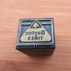 Vintage Letterpress Printers Block Tires by Dayton Logo