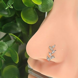 Triple Leaf Curved Nose Hoop . Versatile 316L Surgical Steel. Clear Stone Accents. Cartilage Ring. Dainty and Minimal. Timeless Body Jewelry