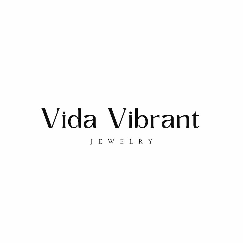 May include: Vida Vibrant Jewelry logo with the text "Vida Vibrant" in a serif font and the word "JEWELRY" in a smaller font below.