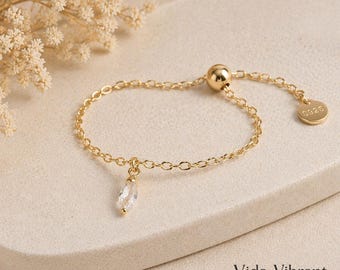 Lumi Drop Chain Ring • Clear Crystal Dangle • Gold-Plated Sterling Silver• Adjustable Ring