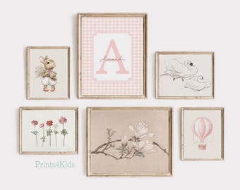May include: A set of eight framed prints featuring various illustrations. The prints include a pink gingham print with the letter A and the name Amanda, a bunny holding flowers, a branch with white flowers, a hot air balloon, and two swans.