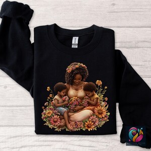 Black Mom And Kids Png Mother's Day Shirt Png Black People Mother Clipart African American Momma Stickers Afro Woman Family Png Design - showing the design in a black sweatshirt mockup