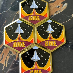 A compilation of GameStop NFT Beta Launch Pins