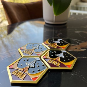 A compilation of GameStop NFT Beta Launch Pins