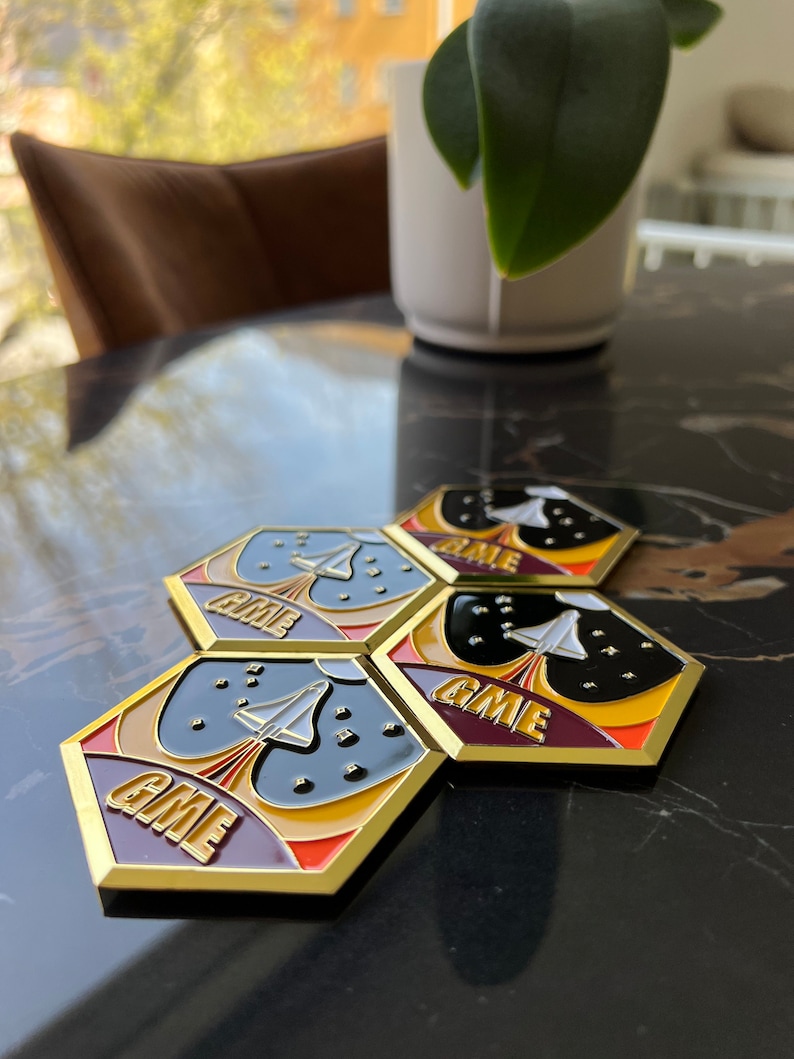 A compilation of GameStop NFT Beta Launch Pins