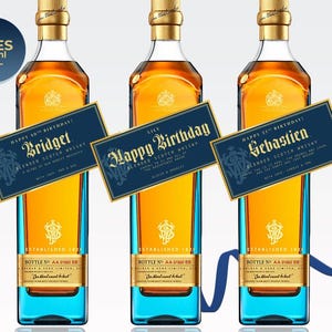 Customizable Johnnie Walker Blue Label bottle labels for special occasions. Designs include wedding, groomsmen or best man proposal, milestone birthday, and corporate gifting. Labels feature sleek black and gold color schemes with bold, elegant typography. All text areas are customizable during the order process. Free shipping and fully personalized options available. Labels are displayed on a Johnnie Walker Blues Label whiskey bottle.