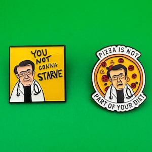 May include: Two enamel pins featuring a cartoon doctor. One pin says "You not gonna starve" and the other says "Pizza is not part of your diet".