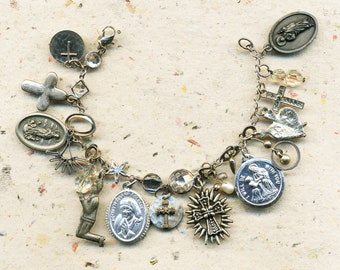 FAITH a charm bracelet with charms of faith