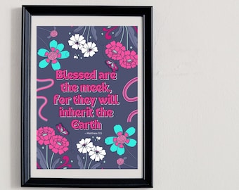 May include: A framed print with a dark blue background and pink, white, and blue flowers. The print features the text "Blessed are the meek, for they will inherit the Earth - Matthew 5:5".