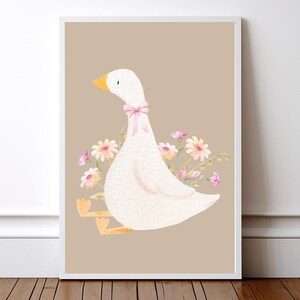 May include: A watercolor illustration of a white goose with a pink bow sitting on a tan background. The goose is surrounded by pink and yellow flowers.