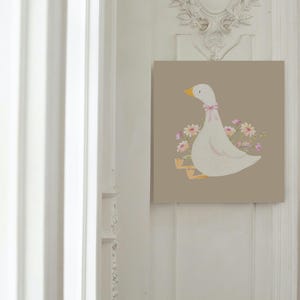 May include: A white goose with a pink bow sits on a light brown background with pink and yellow flowers behind it.