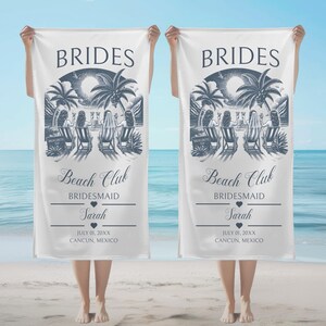May include: Two white beach towels featuring a dark blue graphic of four people sitting in lounge chairs on a beach under palm trees. The text reads BRIDES Beach Club BRIDESMAID Sarah JULY 01, 20XX CANCUN, MEXICO with small heart icons.